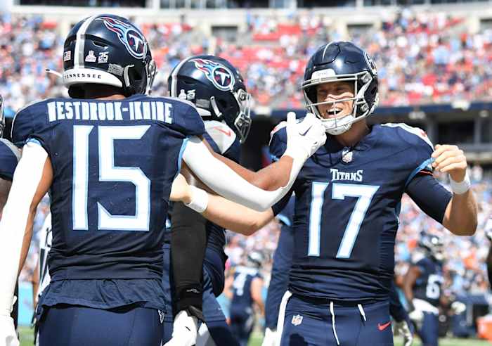 Tennessee Titans wide receiver Nick Westbrook-Ikhine (15) celebrates with quarterback Ryan Tannehill (17) after a touchdown during the first half against the Cincinnati Bengals at Nissan Stadium.